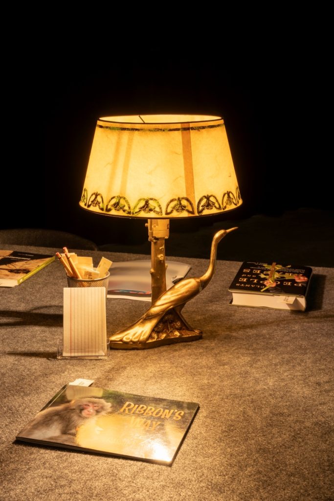 Detail view of the reading room tables and selected reading material.